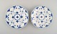 Two Royal Copenhagen blue fluted full lace plates in openwork porcelain. 
Decoration number: 1/1086.
