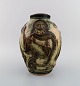Jais Nielsen for Royal Copenhagen. Large lidded jar in glazed ceramics with 
biblical motifs in relief. Model number 3301. Beautiful sung glaze. 1930s / 40s.
