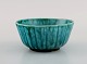Wilhelm Kåge for Gustavsberg. Argenta art deco bowl in glazed ceramics. 
Beautiful glaze in shades of green. 1940