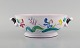 Stig Lindberg 
for Gustavsberg 
Studio Hand. 
Bowl with 
handles in 
glazed faience 
with 
hand-painted 
...