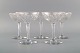 Baccarat, Frankrig. Fem champagneskåle i klart mundblæst krystalglas. Midt 
1900-tallet.
