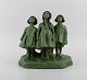 Alice Nordin for Ipsen's, Denmark. Large sculpture in jade green glazed ceramics. Three girls ...
