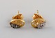Danish jeweler. A pair of ear studs in 14 carat gold adorned with bright 
diamonds. Late 20th century.
