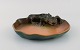 Ipsen's, 
Denmark. Rare 
dish in 
hand-painted 
glazed ceramics 
modeled with 
lizard. 1920s. 
Model ...