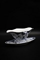 Royal Copenhagen Blue Fluted Half Lace sauceboat on fixed dish.
RC#1/585. 2.sort. 1850-70. H:10cm. 23x14cm.