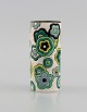 Longwy, France. Art deco vase in glazed stoneware with hand-painted flowers on a 
cream-colored background. 1920s / 30s.
