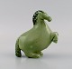 Stig Lindberg for Gustavsberg. Horse figure of stoneware, decorated with green 
Celadon glaze. 1950