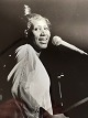 Black and white 
vintage press 
photo of Aretha 
Franklin in 
concert (known 
for Respect, 
among ...