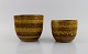 Aldo Londi for Bitossi. Two flower pots in mustard yellow glazed ceramics with 
geometric patterns. 1960s.
