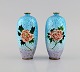 Presumably Limoges. A pair of bronze vases with beautiful enamel work with flowers. 1930s / ...