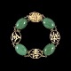 14k Gold 
Bracelet with 
Jade.
Stamped with 
14k
L. 18,5 cm. / 
7,28 inches.
Width 1,3 cm. 
/ 0,51 ...
