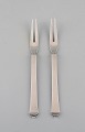 Two Georg Jensen Pyramid cold meat forks in sterling silver. 1930s.

