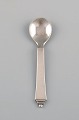 Georg Jensen Pyramid salt spoon in sterling silver. Dated 1933-44.
