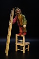 Old French circus toy clown in painted wood with clown clothes in fabric, as well as chair and ...