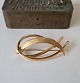 Vintage broce 
in 14 kt gold 
by Hugo Grün
Stampet: H.Gr 
- 585
Dimension 2.5 
x 5.5 cm.