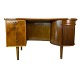 Skrivebordet i 
palisander, 
designet af Kai 
Kristiansen i 
1960'erne, 
udstråler en 
elegant og ...