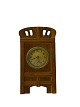 Fireplace clock 
of oak and the 
dial is of 
brass, from 
around the 
1920s. The 
clock is in 
good ...