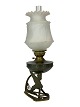Kerosene lamp in the style in Art Noveau of burnished brass from around the 1920s. The lamp is ...