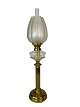 Kerosene lamp of brass with glass shade from around the 1860s. The lamp is in great antique ...