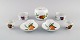Royal Worcester, England. Seven pieces of Evesham porcelain decorated with 
fruits and gold edge. 1960s.
