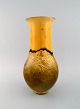 Svend Hammershøi for Kähler, Denmark. Large vase in glazed stoneware. Beautiful 
yellow uranium glaze. 1930s / 40s.
