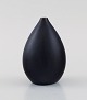 Carl Harry Stålhane (1920-1990) for Rörstrand. Drop shaped vase in glazed 
ceramics. Beautiful glaze in black shades. Mid-20th century.
