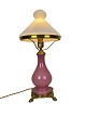 Table lamp with 
frame of pink 
opaline glass 
and shade of 
white opaline 
glass, and foot 
of brass, ...
