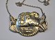 Necklace / 
pendant in 
silver, 20th 
century. 
Decorated with 
bird. Stamped: 
J.B With chain. 
Chain ...