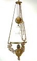 Large kerosene 
lamp of 
patinated brass 
and shade of 
white opaline 
glass from 
around the 
1880s. ...