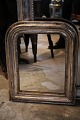 French 1800 century Louis Philippe silver fireplace mirror with finely decorated frame and ...