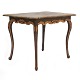 Mid 18th 
century Rococo 
table, black 
painted
Table with 
cabriole legs 
and gilt cuts
Sweden ...