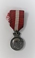 Miniature Pro 
Dania 1940-45. 
King Christian 
the X's Medal 
of Freedom. 
Diameter 15 mm.