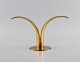 Ivar Ålenius Björk for Ystad metal. Liljan brass candlestick. Swedish design, 
mid 20th century.
