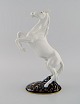 Royal Dux. 
Prancing horse 
in hand-painted 
porcelain. 
1940s.
Measures: 31 x 
19 cm
In excellent 
...