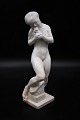 White glazed 
ceramic figure 
from Kähler of 
woman with 
apple. Height: 
28cm. Is intact 
and in good ...