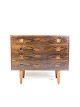 Chest of drawers in rosewood of Danish design from the 1960s. The chest is in great vintage ...
