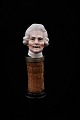 Funny, old wine stopper in painted porcelain with bust of Nobel Lord.