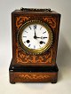 19th century 
carriage clock. 
Probably 
Germany. 
Rosewood box 
with marquetry. 
Enamel dial 
with ...