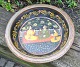 Large Persian 
hand-painted 
dish in clay, 
19th century. 
Scene with two 
seated men 
drinking wine 
...