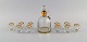 Baccarat, Frankrig. Art deco vodka service til 10 personer. Mundblæst 
krystalglas med guldkant. 1930