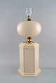 Le Dauphin, 
France. Large 
table lamp in 
cream lacquered 
metal and 
brass. 1970s.
Measures: 48 x 
...