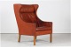 Børge Mogensen (1914-1972)Wing Chair no 2204 with legs of solid oakupholstered with cognac ...