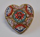 Micro mosaic 
brooch, 19th 
century Italy. 
Performed as a 
heart. Brass 
mounting. H .: 
2.9 cm. W .: 
...