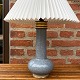 Royal 
Copenhagen 
ceramic lamp, 
with white 
pleated shade