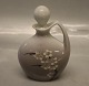 B&G 0015-127 
Art Nouveau 
Small flask 
with stopper 12 
cm decorated 
with 
fruitflower 
Bing and ...