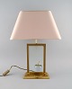 Le Dauphin, 
France. "La 
Pomme" table 
lamp in clear 
art glass and 
brass. 1960s / 
70s.
Measures: ...