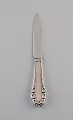 Early Georg Jensen Lily of the valley fruit / butter knife in solid silver 
(830). Dated 1915-1930.
