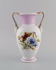 Antique Bing & 
Grøndahl 
porcelain vase 
with 
hand-painted 
butterflies and 
flowers. 
Handles ...