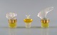Three Lalique 
perfume 
bottles. Late 
20th century.
Largest 
measures: 7.5 x 
6 cm.
In perfect ...
