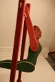 Gymnast in a rack - all made of woodSwings around the top wire when you make the two pins ...